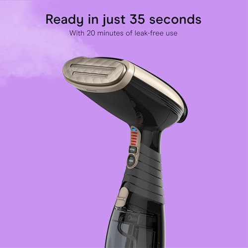 Black handheld steamer for clothes and upholstery — photo 3