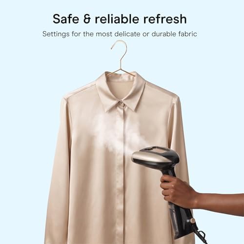 Black handheld steamer for clothes and upholstery — photo 5