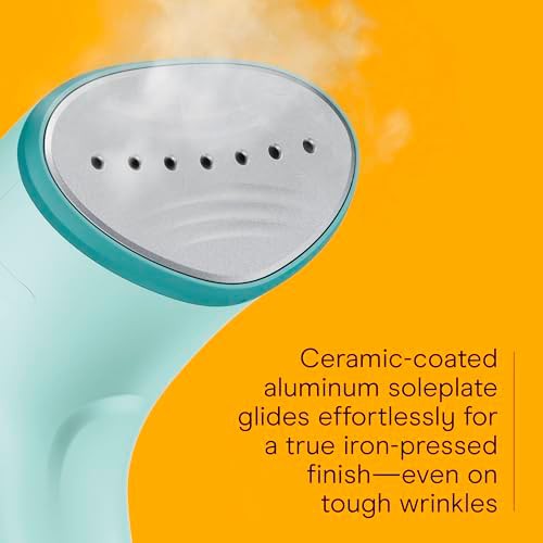 Mint green handheld steamer with ceramic soleplate — photo 3