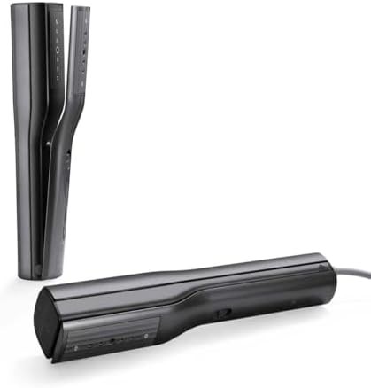 Clip travel steamer with dual voltage support