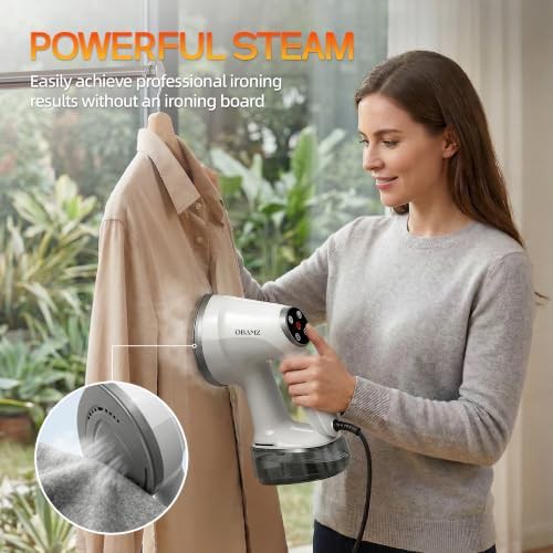 Handheld garment steamer with vacuum suction — photo 3